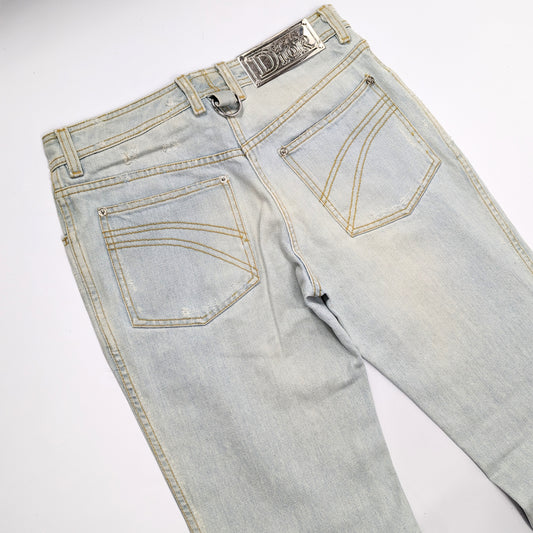 Dior jeans by Galliano decorated with a silver plaque signed “Dior” - S/M