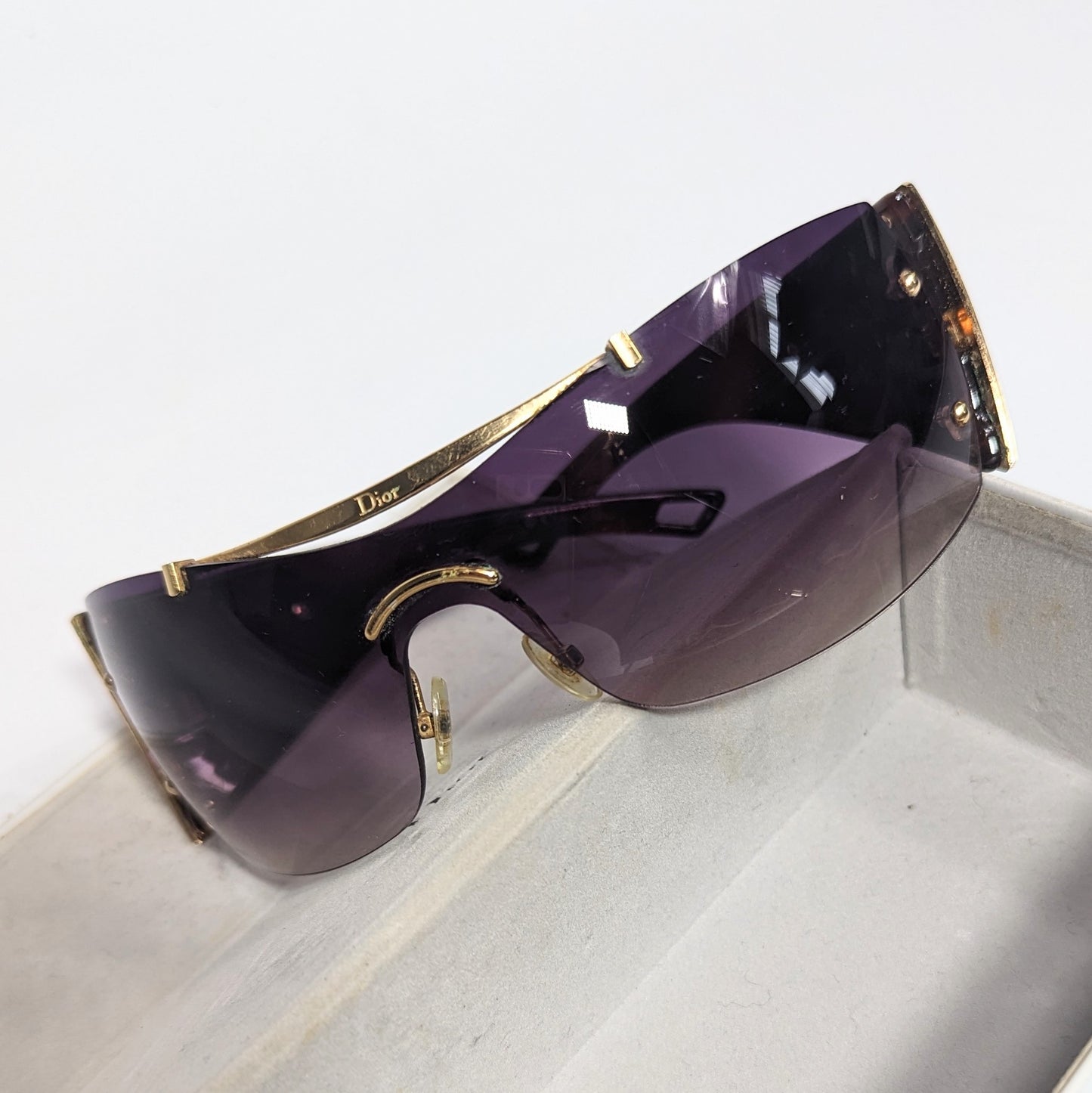 Purple “Diorito 2” mask sunglasses.