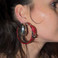 Dior earring by Galliano in burgundy leather