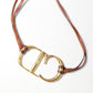 Dior necklace by Gallaino in “CD” leather