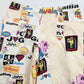 "J'adore John Galliano" monogram print trousers